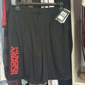 NWT Under Armour Boys YXL Black Shorts with Red Logo